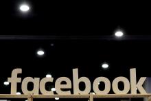 A Facebook sign is displayed at the Conservative Political Action Conference (CPAC) at National Harbor, Maryland, U.S., February 23, 2018. PHOTO BY REUTERS/Joshua Roberts