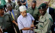 Suspected Kenyan ring-leader of an ivory smuggling gang Feisal Ali Mohamed, also one of the nine most wanted environmental crime fugitives worldwide listed by Interpol, is escorted after the judgment on a case in which he had been charged with dealing and possession of 2,152 kg of ivory in Mombasa, Kenya, July 22, 2016. PHOTO BY REUTERS/Joseph Okanga