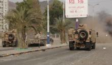 Military vehicles of the Southern Resistance fighters move during clashes with Houthi fighters on a street in Yemen's southern port city of Aden, July 17, 2015. PHOTO BY REUTERS/Stringer