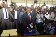 Frelimo presidential candidate Filipe Nyusi casts his ballot in the general election at a secondary school in Maputo, October 15, 2014. PHOTO BY REUTERS/Grant Lee Neuenburg