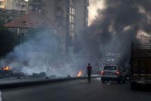 Protestors set uncollected garbage on fire and block a road as they protest against the ongoing refuse crisis in Beirut, Lebanon, July 25, 2015. PHOTO BY REUTERS/Aziz Taher