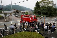 A firefigters' rescue unit car drives in front of a facility for the disabled, where a deadly attack by a knife-wielding man took place, in Sagamihara, Kanagawa prefecture, Japan, July 16, 2016. PHOTO BY REUTERS/Issei Kato