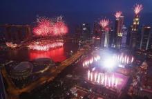Fireworks explode during a Golden Jubilee celebration parade rehearsal in Singapore August 1, 2015. Singapore marks 50 years of independence on August 9. PHOTO BY REUTERS/Edgar Su