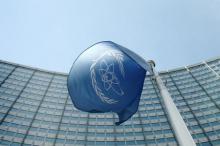 The flag of the International Atomic Energy Agency (IAEA) flies in front of its headquarters in Vienna, Austria, May 28, 2015. PHOTO BY REUTERS/Heinz-Peter Bader