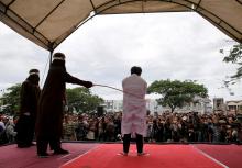 An Indonesian man is publicly caned for having gay sex in Banda Aceh, Aceh province, Indonesia, May 23, 2017. PHOTO BY REUTERS/Beawiharta