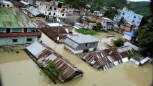 An aerial view showing the town half-submerged in floodwaters following landslides triggered by heavy rain in Khagrachari, Bangladesh, in this still frame taken from video, June 13, 2017. PHOTO BY REUTERS