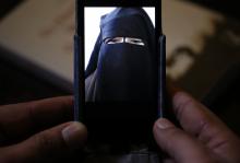 Foad, the brother of 15 year-old Nora who left her home in Avignon for Syria nine months ago, shows a portrait he took last September on his cell phone