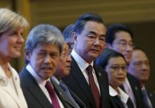 Australia's Foreign Minister Julie Bishop, Brunei's Foreign Minister Mohamed Bolkiah, Cambodia's Foreign Minister Hor Namhong, China's Foreign Minister Wang Yi and Indonesia's Foreign Minister Retno Marsudi  at the 5th East Asia Summmit at the 48th Association of Southeast Asian Nations (ASEAN) foreign ministers meeting in Kuala Lumpur, Malaysia, August 6, 2015. PHOTO BY REUTERS/Olivia Harris