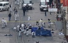 Police forensic experts inspect the area after a suicide bombing in a major shopping and tourist district in central Istanbul, March 19, 2016. PHOTO BY REUTERS/Ismail Coskun