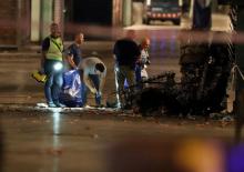 Forensic police officers search for clues near the area where a van crashed into pedestrians at Las Ramblas in Barcelona, Spain, August 18, 2017. PHOTO BY REUTERS/Sergio Perez