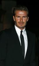 Former England soccer captain David Beckham arrives for a London Fashion Week event to celebrate the Global Fund in London