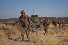 French soldiers patrol in the Terz valley, about 60 km (37 miles) south of the town of Tessalit in northern Mali, March 21, 2013. PHOTO BY REUTERS/Francois Rihouay