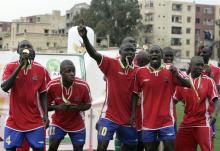Gambia players celebrate with their medals after their Confederation of African Football (CAF) U-17 Championship final soccer match in Dar el Beida in Algiers