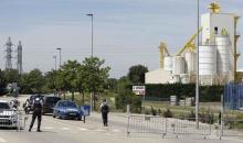 French Gendarmes block the access road to the industrial area of Saint-Quentin-Fallavier, outside Lyon, France, June 26, 2015. PHOTO BY REUTERS/Emmanuel Foudrot
