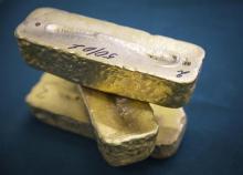 Gold alloy bars are seen at Altyntau gold mine extraction factor