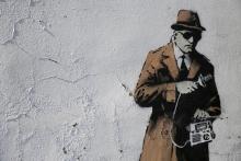 A detail from graffiti art is seen on a wall near the headquarters of Britain's eavesdropping agency, Government Communications Headquarters, known as GCHQ, in Cheltenham, western England, April 16, 2014. PHOTO BY REUTERS/Eddie Keogh