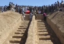 Graves are prepared for the burial of civilians, who were killed by insurgents at Mirza Olang village, in Sar-e Pul province, Afghanistan, August 16, 2017. PHOTO BY REUTERS/Stringer