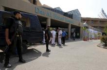 Egyptian police personnel stand guard outside Dar Al Fouad Hospital, where injured tourists who were mistakenly targeted in a military operation "chasing terrorist elements" are recovering, in Cairo, Egypt, September 14, 2015. PHOTO BY REUTERS/Mohamed Abd El Ghany