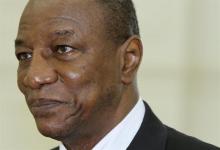 Guinea's President Alpha Conde arrives for a meeting with Cambodia's Prime Minister Hun Sen