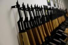 Weapons are displayed during the presentation of guns which were seized in Rio de Janeiro's international airport, Brazil, June 1, 2017. PHOTO BY REUTERS/Ricardo Moraes