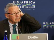 Zambia's Guy Scott (L) listens as U.S. President Barack Obama (not pictured) speaks, at the first Leaders' Session of the U.S.-Africa Leaders Summit, at the State Department in Washington, August 6, 2014. PHOTO BY REUTERS/Larry Downing