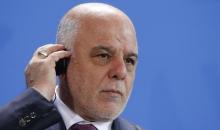 Iraq's Prime Minister Haidar al-Abadi listens to a translation during a news conference at the Chancellery in Berlin, Germany, February 11, 2016. PHOTO BY REUTERS/Fabrizio Bensch