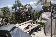 Laundry is laid out on cactuses to dry at a camp for returned Haitians and Haitian-Dominicans, behind a school near the border between Dominican Republic and Haiti, in Malpasse, Haiti, August 3, 2015. PHOTO BY REUTERS/Andres Martinez Casares