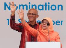 Singapore's President-elect Halimah Yacob and her husband Mohammed Abdullah Alhabshee address supporters before leaving the nomination centre in Singapore, September 13, 2017. PHOTO BY REUTERS/Edgar Su