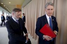 Britain's Foreign Minister Philip Hammond (R) and Foreign Ministry Political Director Tim Barrow arrive with fellow G7 foreign ministers for a working session, the fourth session of the their meetings in Hiroshima, Japan, April 11, 2016. PHOTO BY REUTERS/Jonathan Ernst