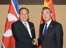 People's Republic of China Foreign Minister Wang Yi greets North Korean Foreign Minister Ri Yong Ho, during a bilateral meeting at Manila, Philippines, August 6, 2017. PHOTO BY REUTERS/Xinhua