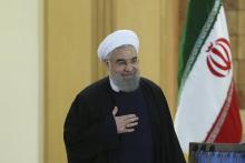 Iranian President Hassan Rouhani gestures as he arrives for a news conference in Tehran, Iran, January 17, 2016. PHOTO BY REUTERS/President.ir