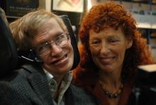 British astrophysicist Professor Stephen Hawking and his wife Elaine (R) visit the stand of German bookseller Rowohlt at the Frankfurt book fair, October 19, 2005. PHOTO BY REUTERS/Alex Grimm