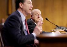 Director of National Intelligence (DNI) James Clapper listens as FBI Director James Comey testifies to the Senate Select Committee on Intelligence hearing on “Russia’s intelligence activities" on Capitol Hill in Washington, U.S. January 10, 2017. PHOTO BY REUTERS/Joshua Roberts