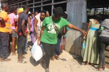 People displaced by a separatist conflict in western Cameron receive a food distribution in Douala, Cameroon, November 12, 2018. PHOTO BY Thomson Reuters Foundation/Stringer