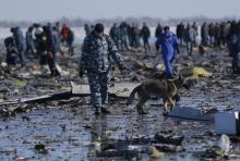 Emergencies Ministry members work at the crash site of a Boeing 737-800 Flight FZ981 operated by Dubai-based budget carrier Flydubai, at the airport of Rostov-On-Don, Russia, March 20, 2016. PHOTO BY REUTERS/Maxim Shemetov
