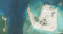 The artificial island at the southern end of Mischief Reef showing a newly-built seawall on its north side and a completed dock are shown in this Center for Strategic and International Studies (CSIS) Asia Maritime Transparency Initiative January 8, 2016 satellite image, January 15, 2016. PHOTO BY REUTERS/CSIS Asia Maritime Transparency Initiative