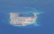 Chinese dredging vessels are purportedly seen in the waters around Fiery Cross Reef in the disputed Spratly Islands in the South China Sea in this still image from video taken by a P-8A Poseidon surveillance aircraft provided by the United States Navy, May 21, 2015. PHOTO BY REUTERS/U.S. Navy