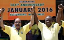 South Africa's President Jacob Zuma (L), who is also the president of the ruling party, the African National Congress (ANC), gestures next to his Deputy President Cyril Ramaphosa during the party's 104th anniversary celebrations in Rustenburg, January 9, 2016. PHOTO BY REUTERS/Siphiwe Sibeko