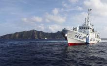 Japan Coast Guard vessel PS206 Houou sails in front of Uotsuri island, one of the disputed islands, called Senkaku in Japan and Diaoyu in China