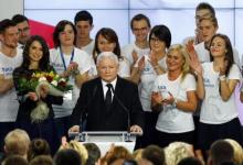 The leader of Poland's main opposition party Law and Justice (PiS) Jaroslaw Kaczynski addresses as his daughter Marta (L) looks on after the exit poll results are announced in Warsaw, Poland, October 25, 2015. PHOTO BY REUTERS/Pawel Kopczynski