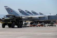 Russian military jets are seen at Hmeymim air base in Syria, June 18, 2016. PHOTO BY REUTERS/Vadim Savitsky