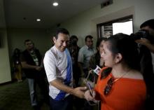 Guatemalan presidential candidate Jimmy Morales of the National Convergence Front greets a journalist after a news conference in Guatemala City, September 7, 2015. PHOTO BY REUTERS/Jorge Dan Lopez