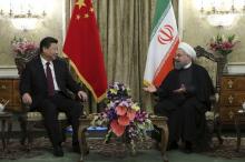 Iranian President Hassan Rouhani (R) meets with Chinese President Xi Jinping in Tehran, Iran, January 23, 2016. PHOTO BY REUTERS/President.ir