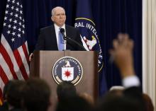 Director of the Central Intelligence Agency (CIA) John Brennan looks out to the press during a rare news conference at CIA Headquarters in Virginia, December 11, 2014. PHOTO BY REUTERS/Larry Downing