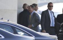 U.S. Ambassador to Germany John Emerson (C) is surrounded by body guards as he arrives at the Chancellery in Berlin, Germany, July 2, 2015. PHOTO BY REUTERS/Fabrizio Bensch
