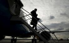 U.S. Secretary of State John Kerry steps from his plane upon his arrival in Vienna, Austria on what is expected to be "implementation day," the day the International Atomic Energy Agency (IAEA) verified that Iran has met all conditions under the nuclear deal, January 16, 2016. PHOTO BY REUTERS/Kevin Lamarque
