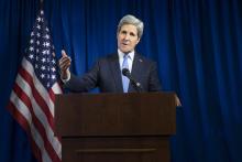 U.S. Secretary of State John Kerry delivers remarks during a news conference at the U.S. Embassy in London, December 16, 2014. PHOTO BY REUTERS/Evan Vucci
