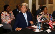 U.S. Secretary of State John Kerry (L) flanked by Kenya's Foreign Affairs Cabinet Secretary Amina Mohamed (R) attends a meeting with Foreign Affairs Ministers from Eastern Africa in Kenya's capital Nairobi, August 22, 2016. PHOTO BY REUTERS/Thomas Mukoya