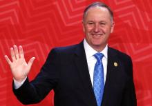 New Zealand's Prime Minister John Key waves to photographers during the APEC (Asia-Pacific Economic Cooperation) Summit in Lima, Peru, November 20, 2016. PHOTO BY REUTERS/Mariana Bazo
