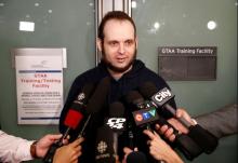 Joshua Boyle speaks to the media after arriving with his wife and three children to Toronto Pearson International Airport, nearly 5 years after he and his wife were abducted in Afghanistan in 2012 by the Taliban-allied Haqqani network, in Toronto, Ontario, Canada, October 13, 2017. PHOTO BY REUTERS/Mark Blinch